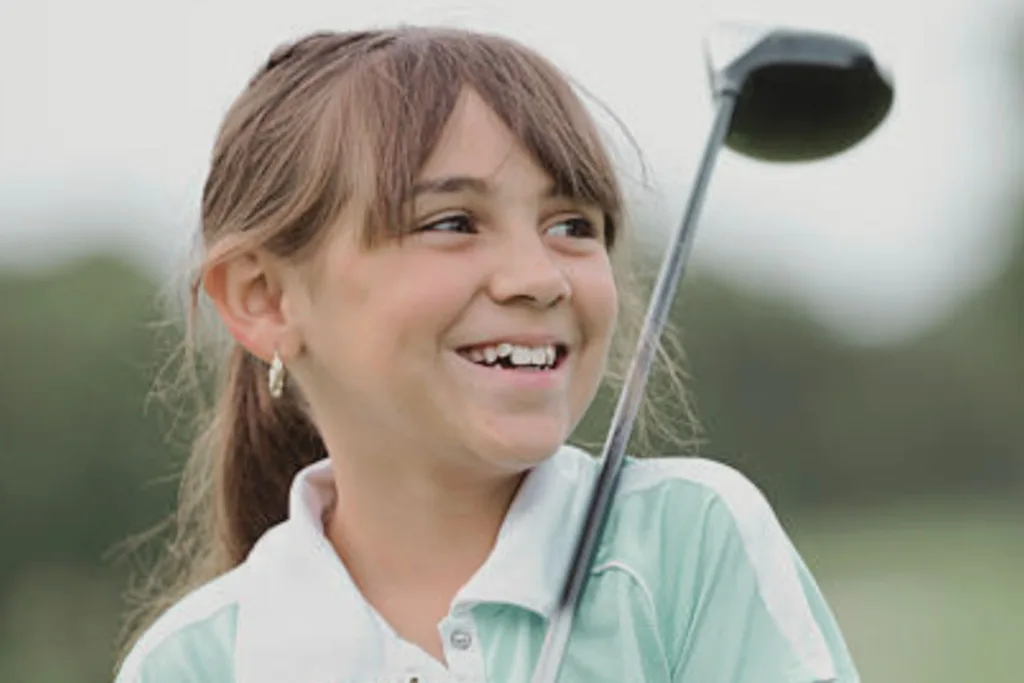 Junior female golfer
